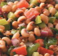 close up photo of salsa made with black eyed peas and other ingredients