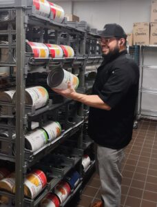 Hispanic man in can room at kitchen