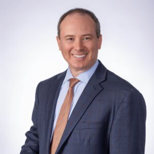 Adult white male in suit and tie